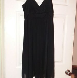 A black dress, a blue tank top and pink shorts.